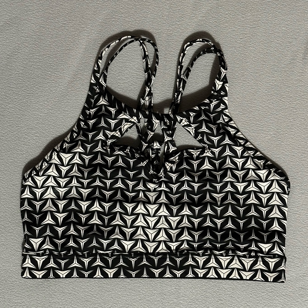 Victoria Sport Bra. Black with white triangles. Special design cut out on top.